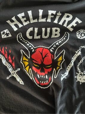 Netflix men’s Black Hellfire Club Graphic Tee with Red and Yellow Skull